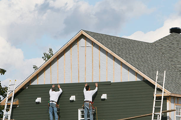 Professional Siding Contractor technician working in Drayden, MD
